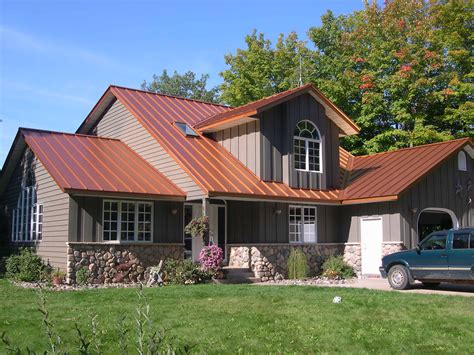 shiny copper metal porch roof on brown house|copper penny metal roofing.